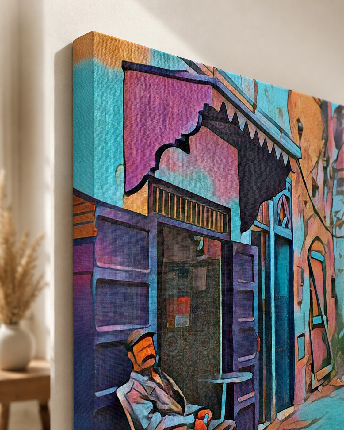 Close-up of a 70 x 100 cm unframed gallery-wrapped canvas featuring a colourful Mediterranean street scene, showing the textured canvas surface, wrapped edge and vibrant print detail.